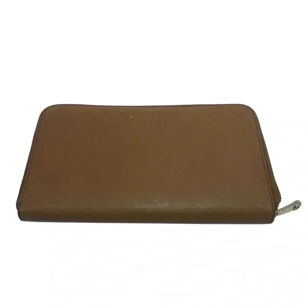Henri Bendel tan leather zipper wallet